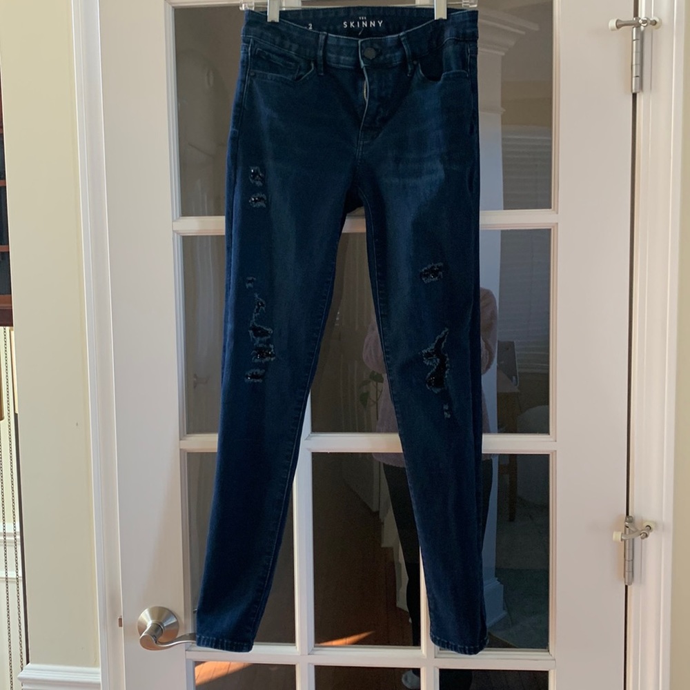 White House Black Market skinny jeans: distressed with black sequins size 2